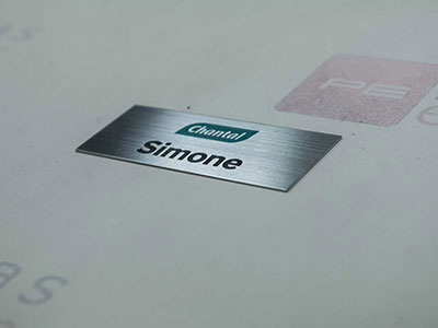 Crachá de aço inox