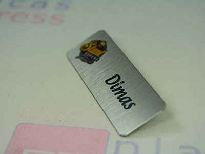 Crachá de aço inox